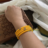 Yellow Silk Thread Bangles with White Stone-G3615